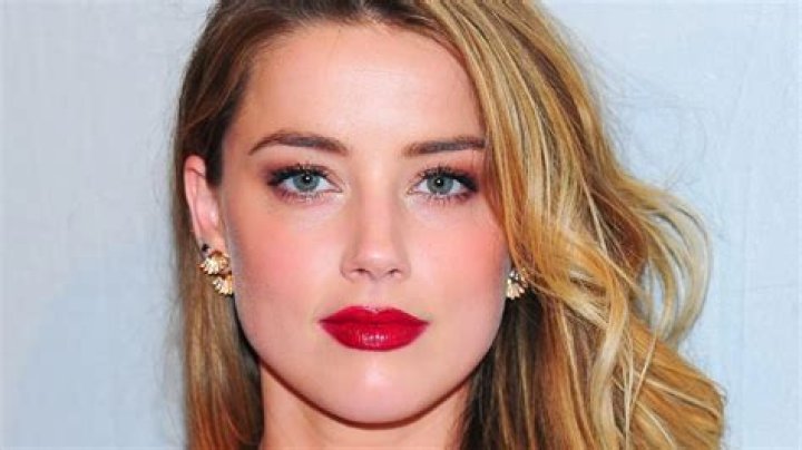 Amber Heard changes her name and moves to Spain to "get away from