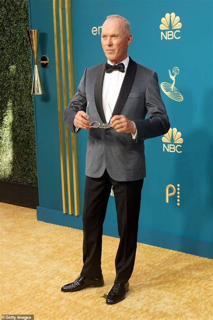 Michael Keaton, 71, brings his blonde girlfriend to the Emmys Daily
