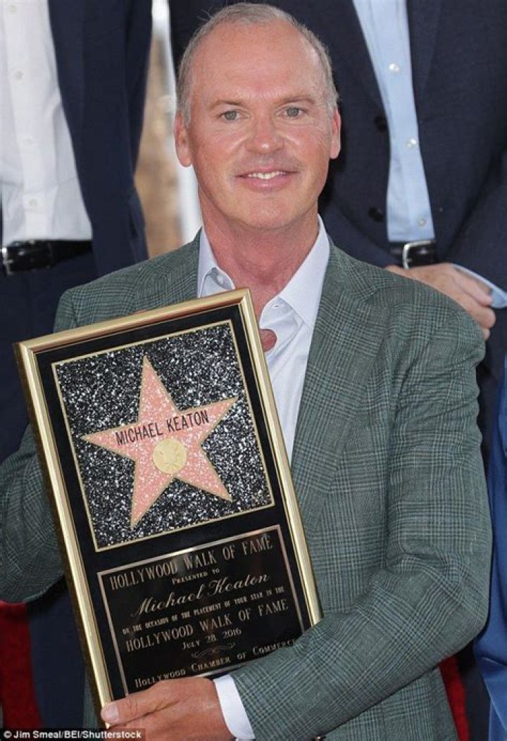 Michael Keaton gets smooch from lady friend at Hollywood star ceremony