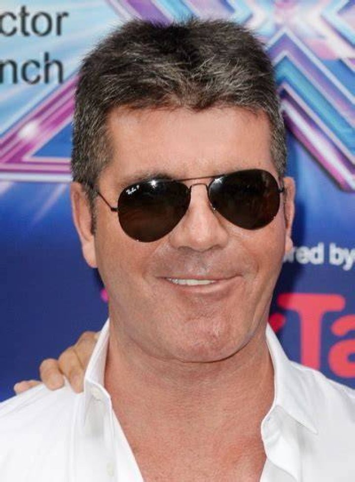 X Factor supremo Simon Cowell shocks sick toddler's mum by phoning her